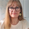 Jo Malt profile headshot of Professor Jo Malt: a white woman with blonde hair, wearing glasses, and a white T-shirt